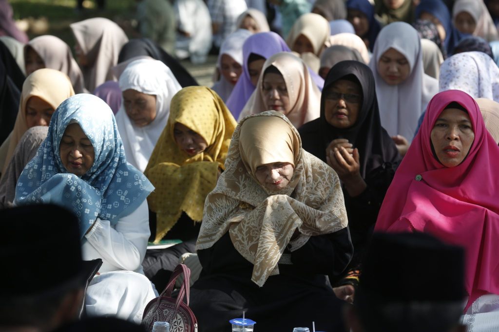 Menschen in Asien gedenken der Tsunami-Opfer von 2004